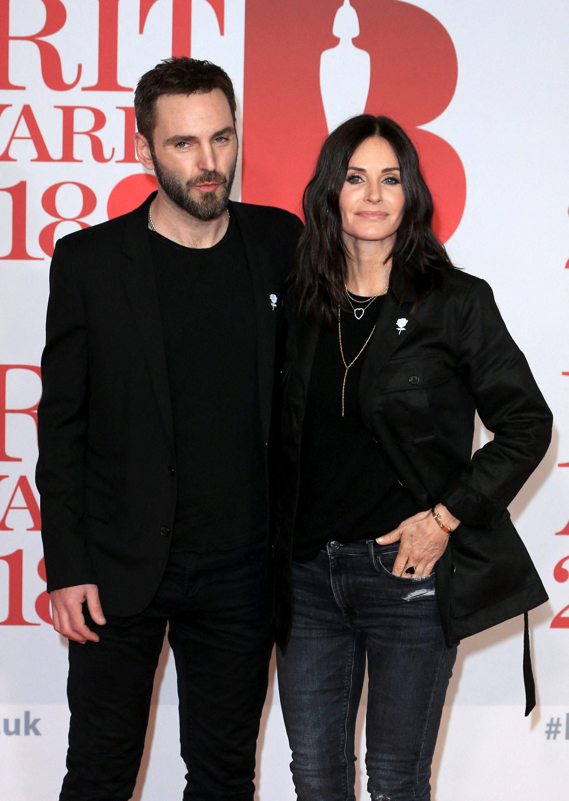 Johnny McDaid and Courteney Cox attend Brit Awards at the O2 Arena in London, UK.