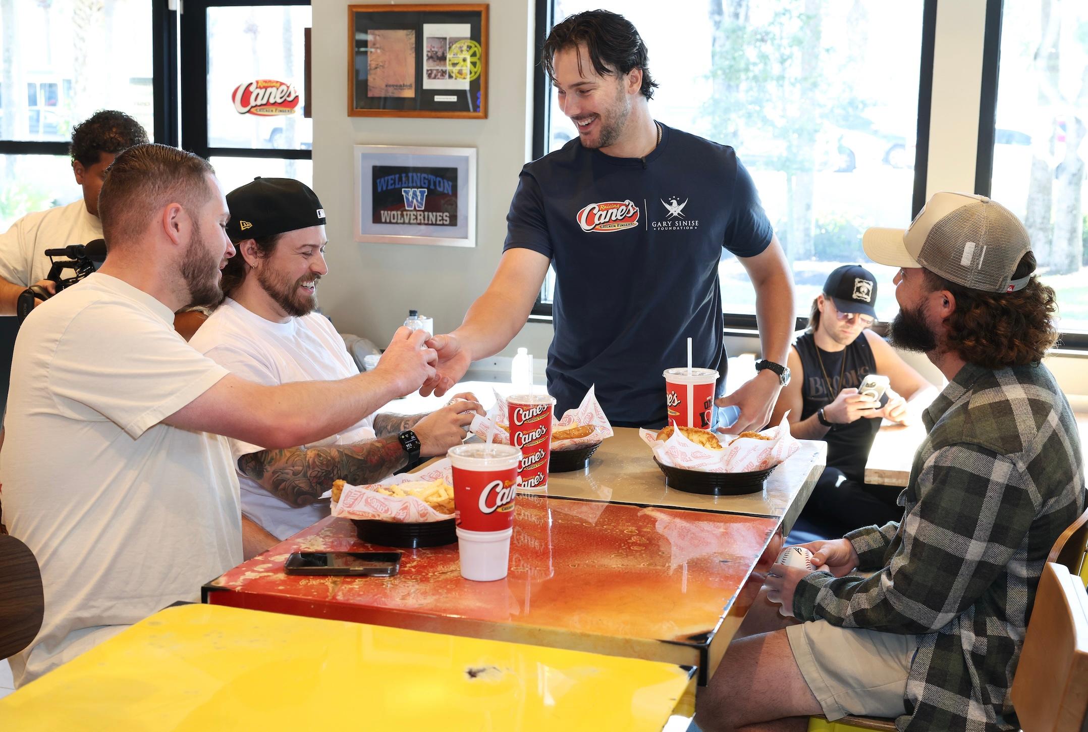Paul Skenes and veterans at Raising Cane's