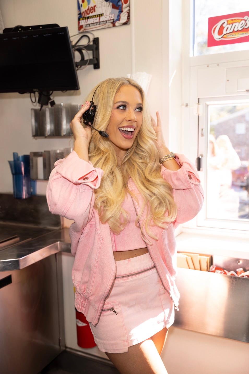 Megan Moroney works drive thru at Raising Cane's