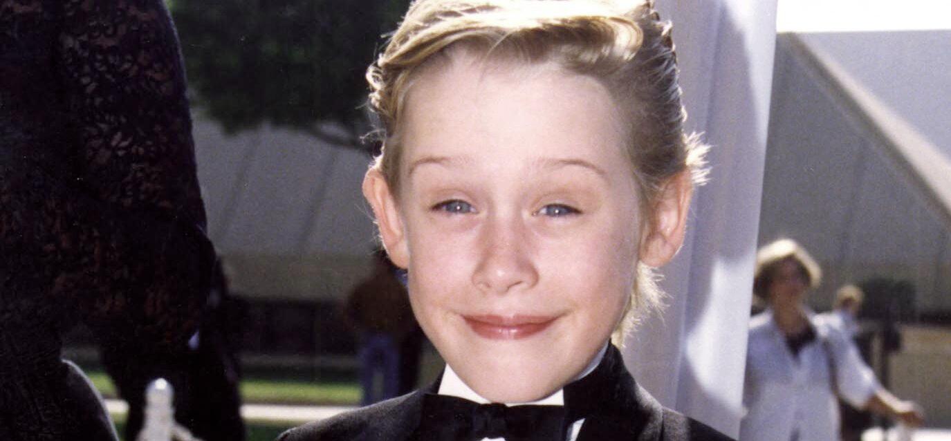 Macaulay Culkin in a tux when he was young