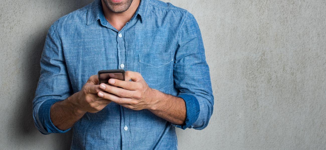 Person typing on their phone