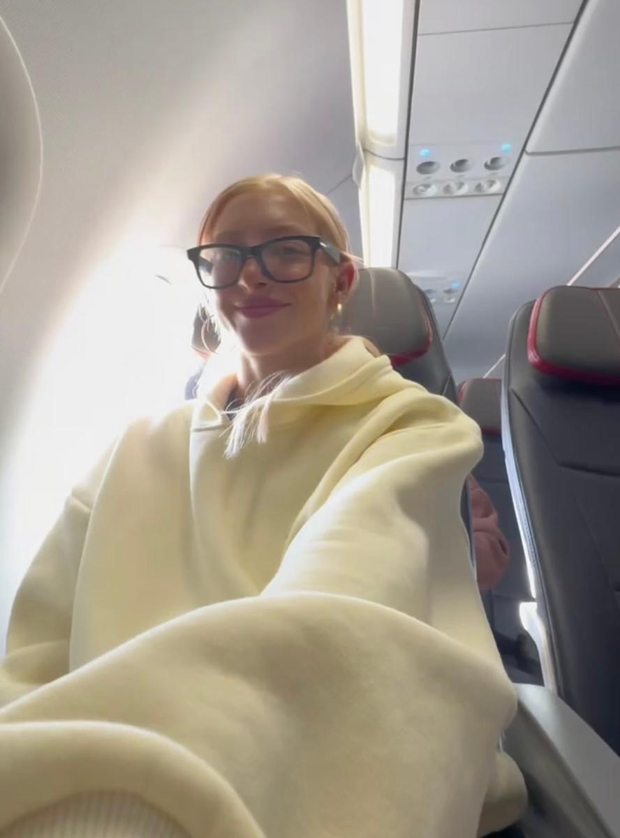 Kay Carlson on the plane