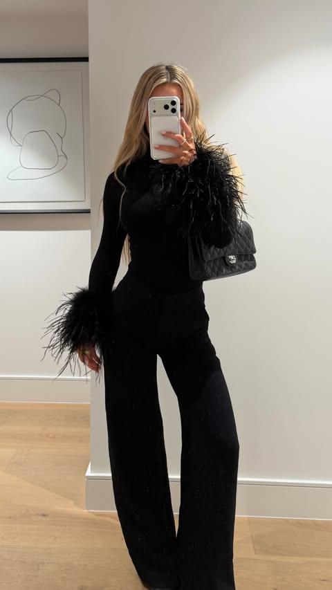 Emily Elizabeth in black on Christmas Eve