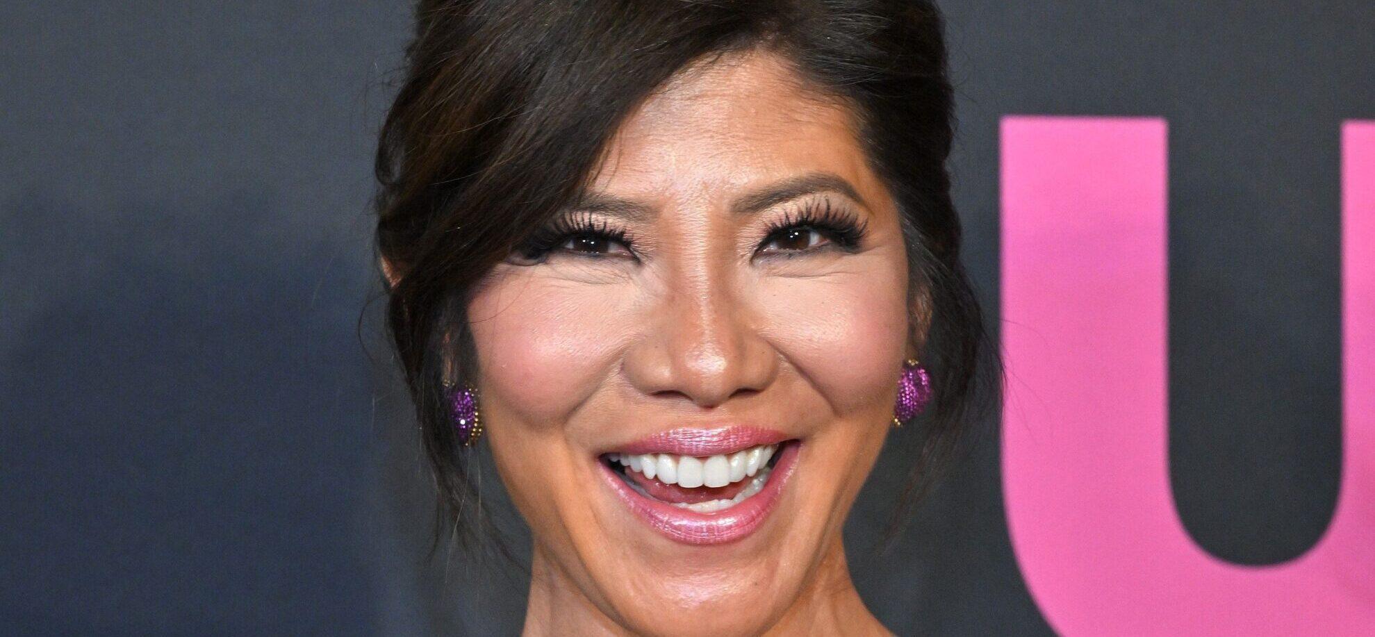 Julie Chen posing on the red carpet.