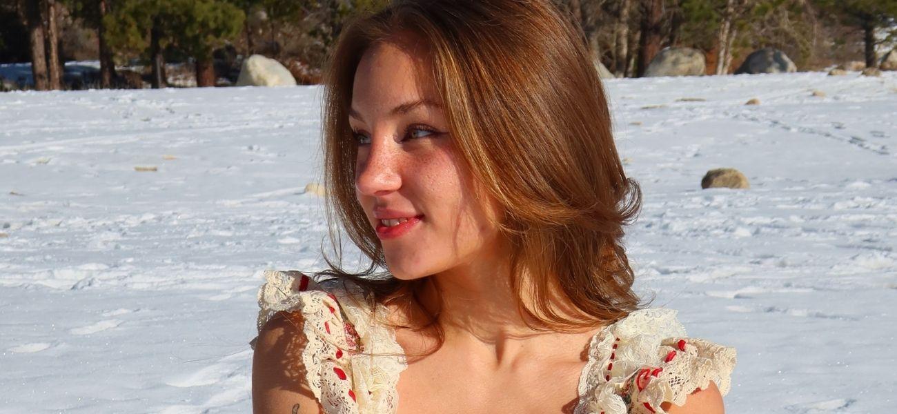 Anya Lacey posing for the camera in snow