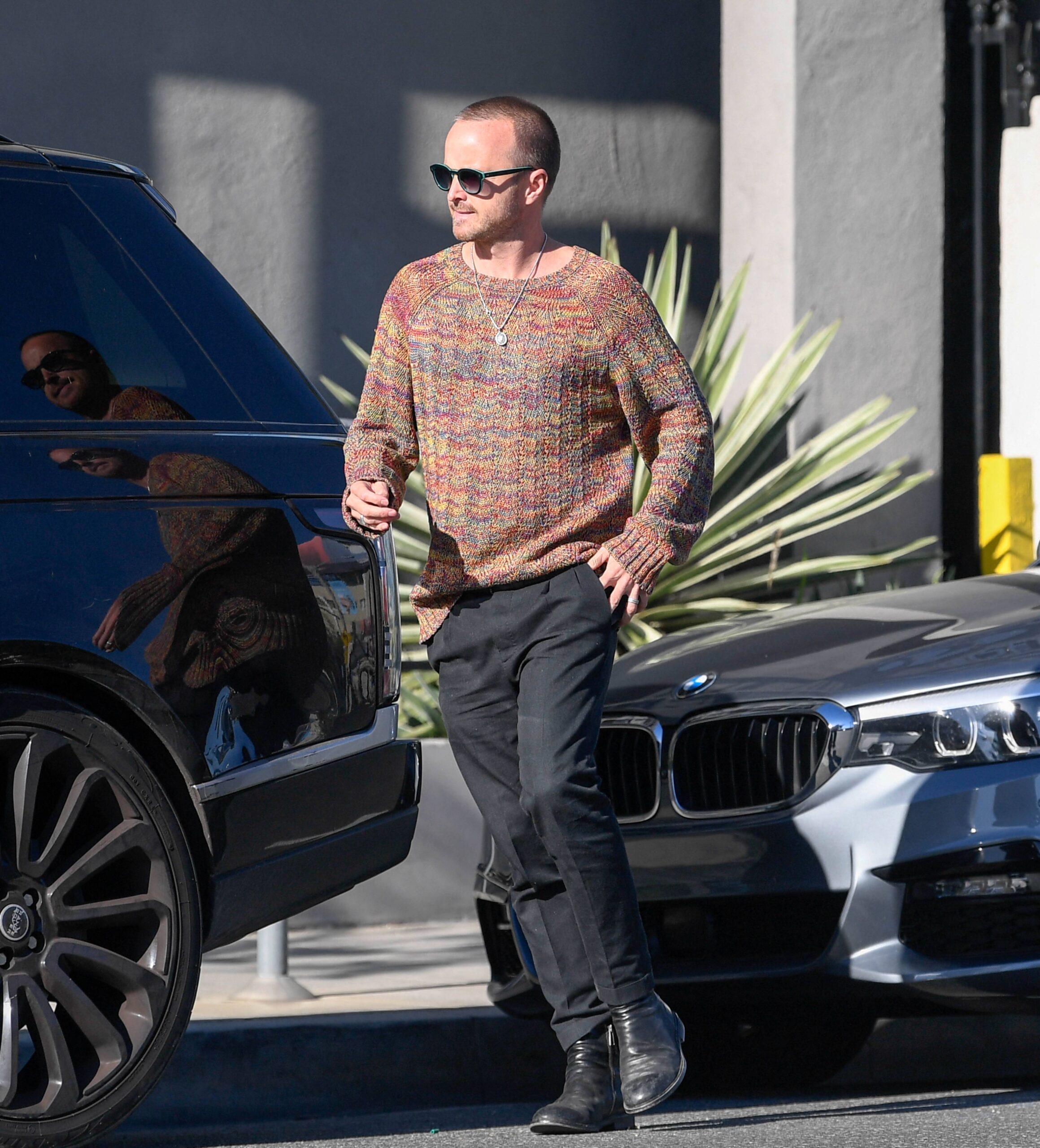 Aaron Paul is seen leaving Pink Taco after having lunch