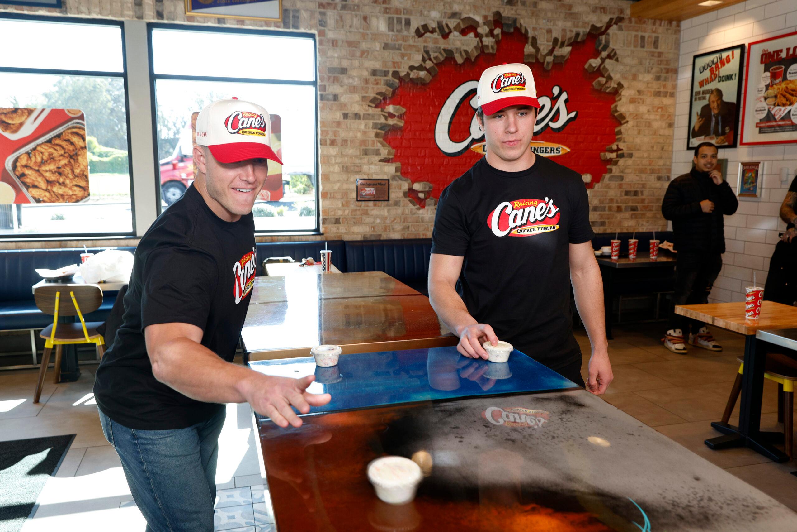 Christian and Luke McCaffrey Work Pre-Pro Bow Shift at Raising Cane's in the Bay Area During Super Bowl Week