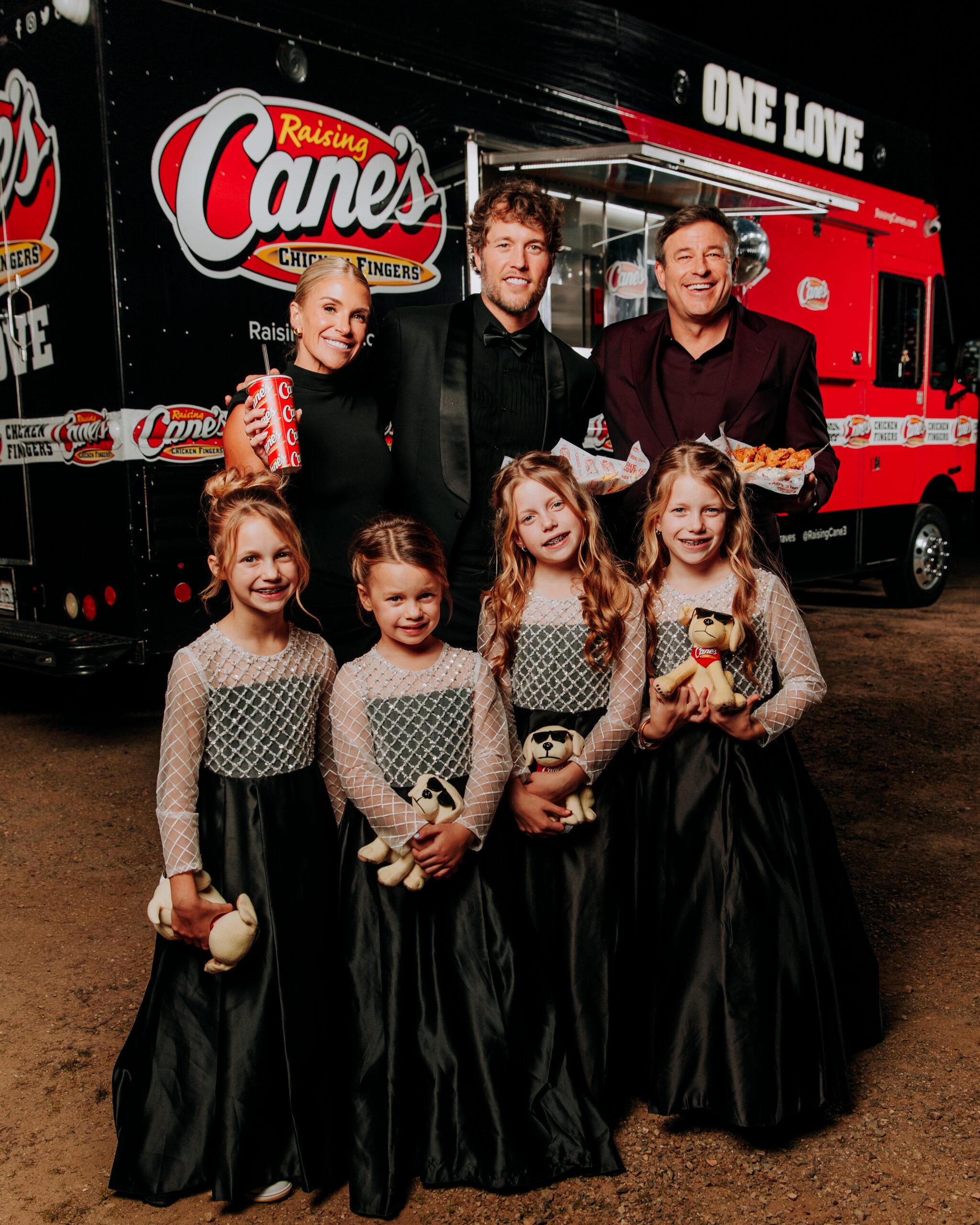 Kelly and Matthew Stafford with kids at Raising Cane's food truck