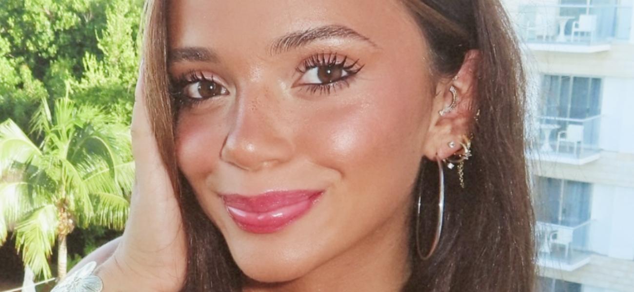 Kayla Manousselis smiles close up