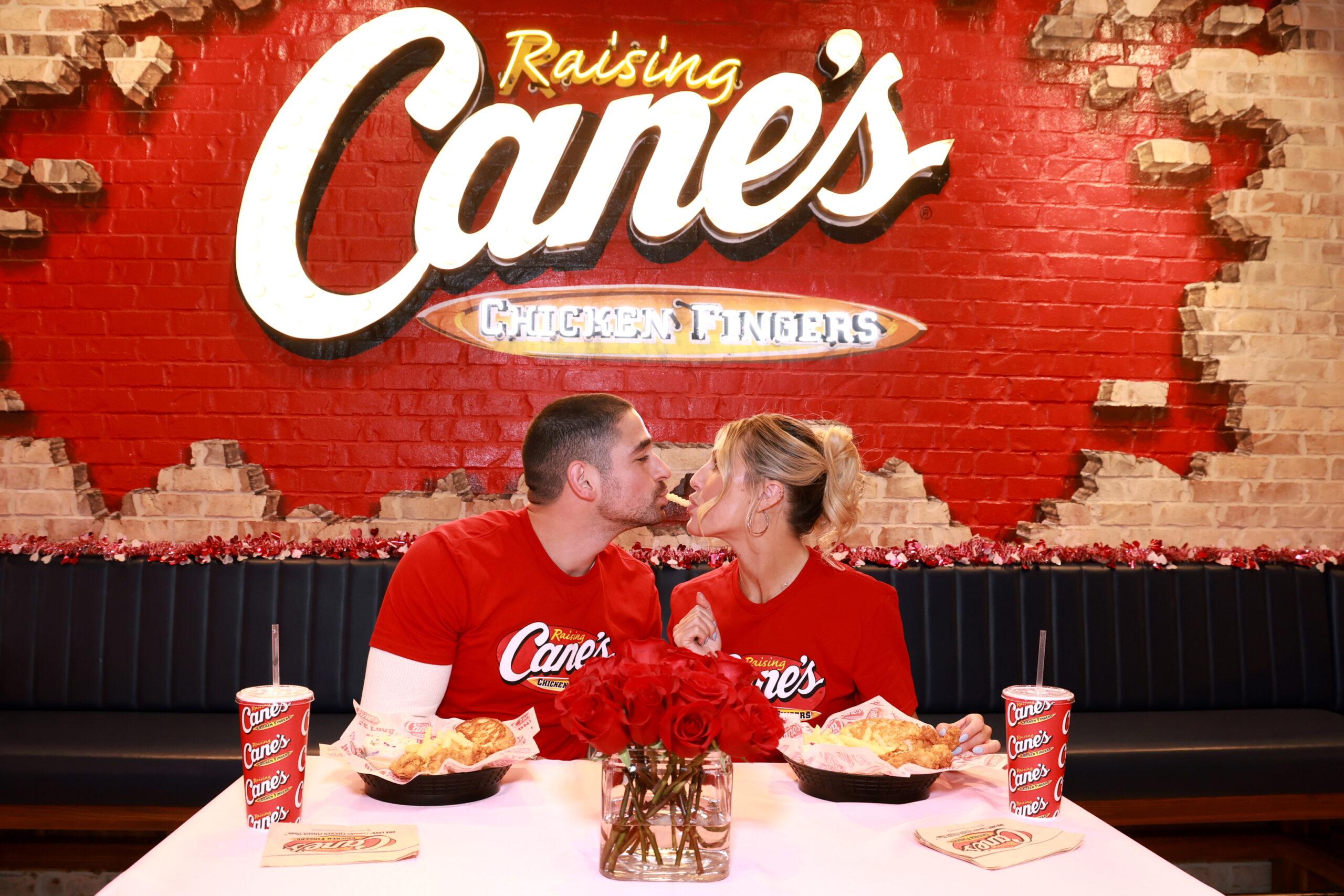 Emma Slater and Alan Bersten share lady and the tramp moment at Raising Cane's