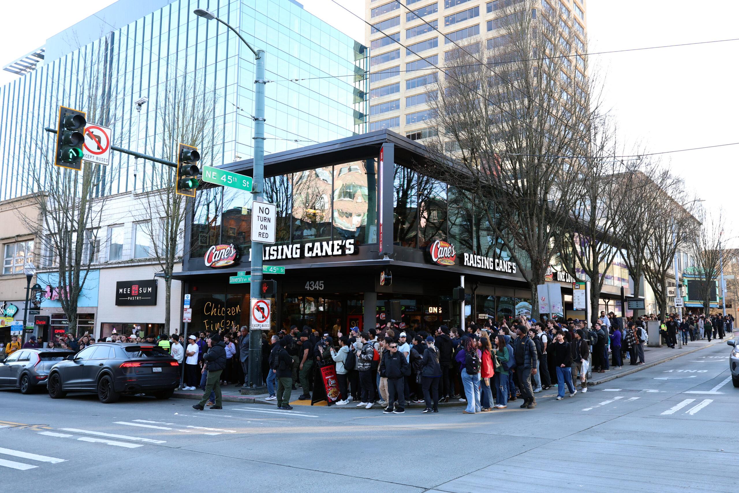 Seahawks fans outside of Raising Cane's