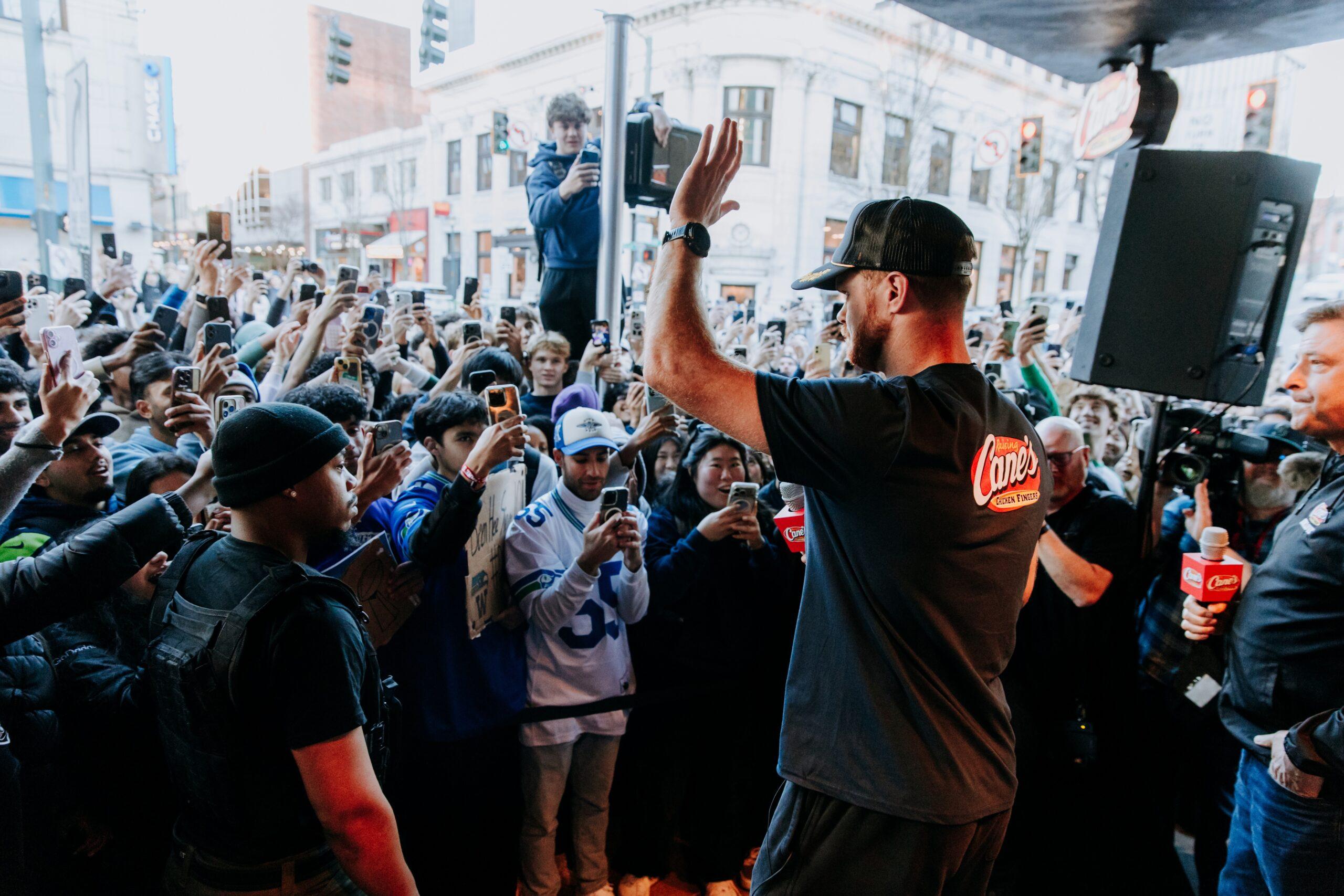 Sam Darnold speaking to fans in Seattle