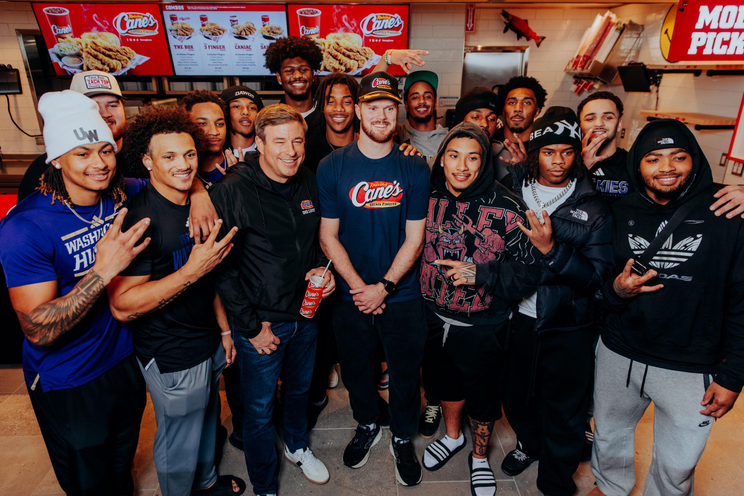 Sam Darnold, Todd Graves, and local Washington football team at Raising Cane's