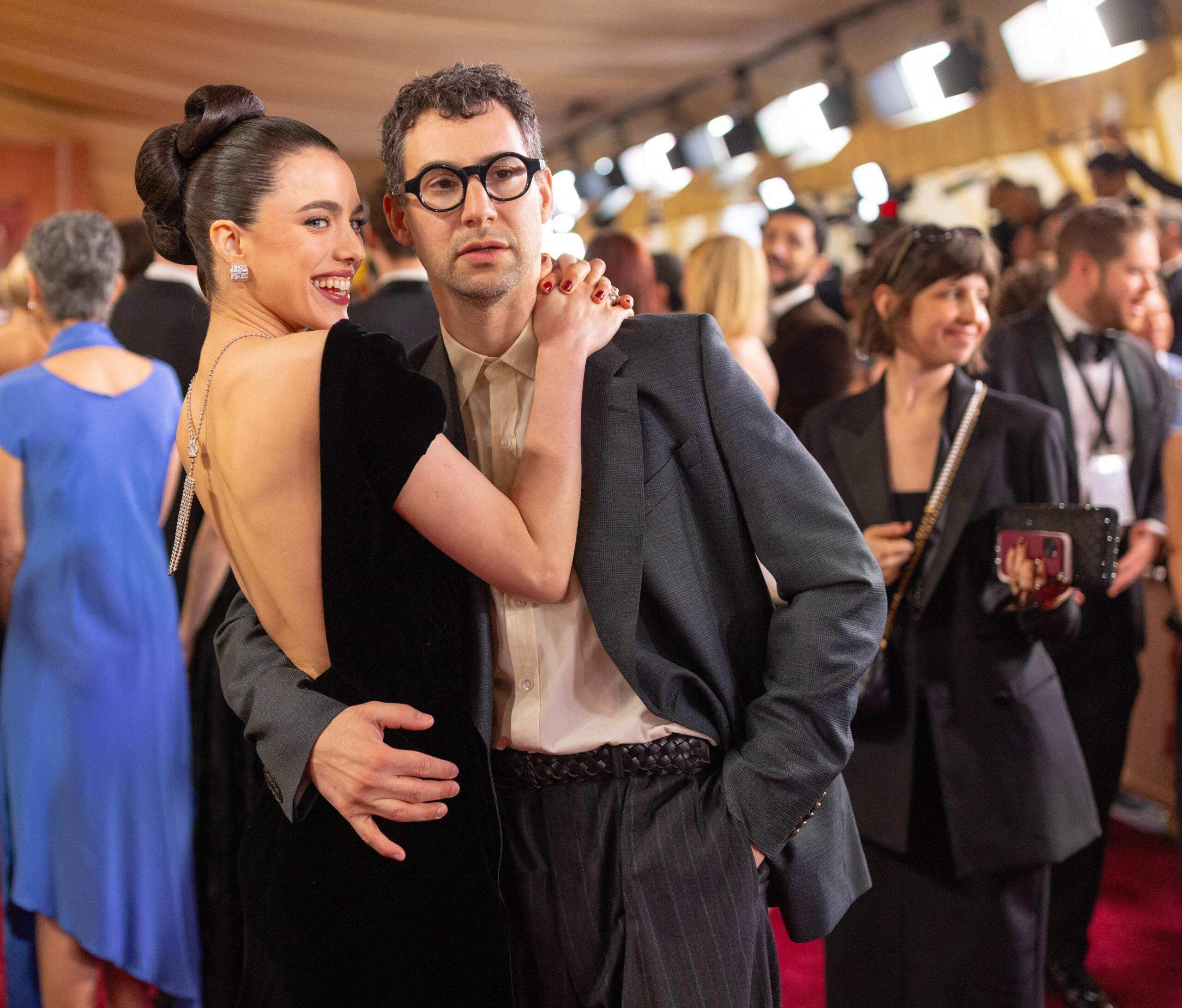 Margaret Qualley and Jack Antonoff posing on red carpet