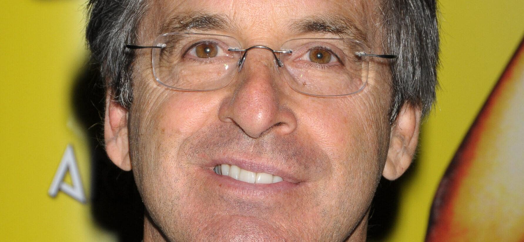 Robert Carradine smiling