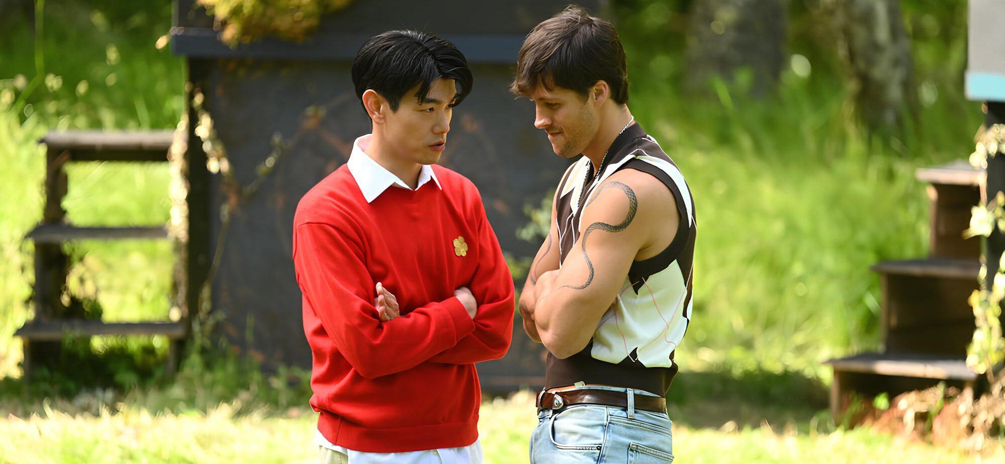 Rob Rausch and Eric Nam during an episode of "The Traitors."