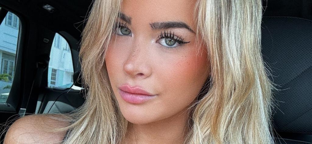 Emily Elizabeth Drops Jaws With Her Busty Display In A Tiny Top