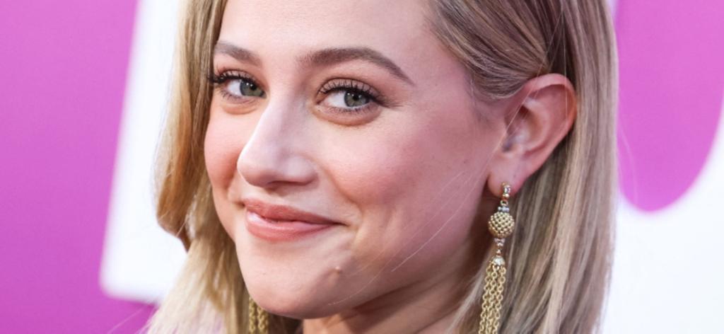 Lili Reinhart Announces &lsquo;Lover&rsquo;s&rsquo; Month In Plunging Pool Bikini