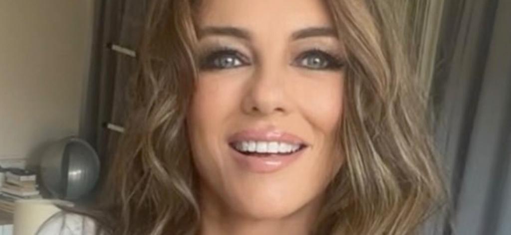 Elizabeth Hurley Encourages 'Breathing' In Tight Plunging Swimsuit