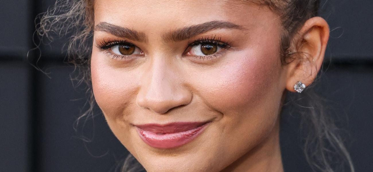 Zendaya Snacks On Poolside Fries In Slinky Braless Dress