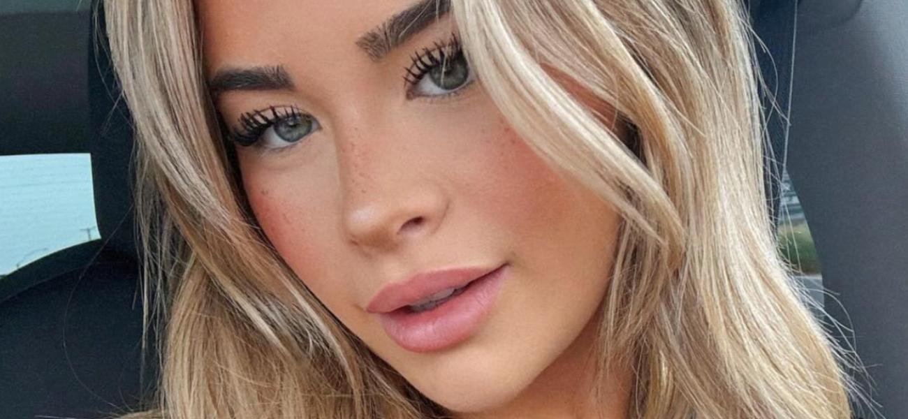 Emily Elizabeth Highlights Her 'Puppies' While Popping Out Her String Bikini