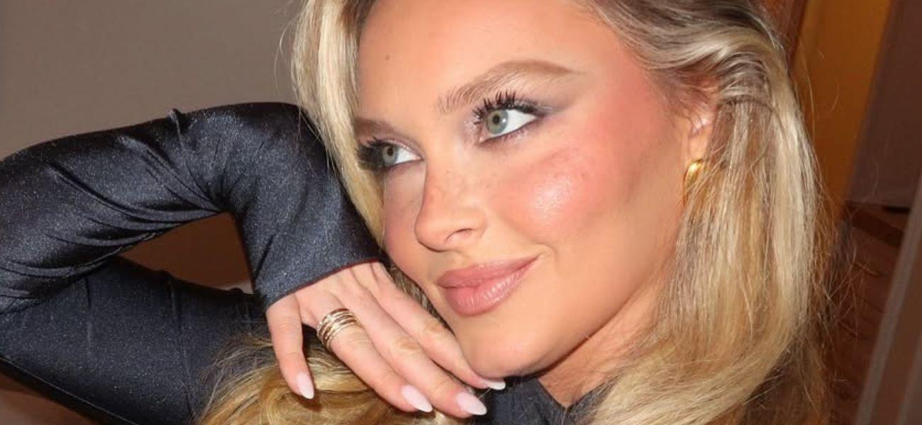 Camille Kostek rouba a cena andando de bicicleta de salto alto por uma grande causa