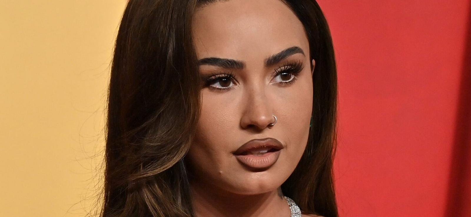 Demi Lovato 'Brings Back The ’80s' In Sultry Sheer Bodysuit Dance Video