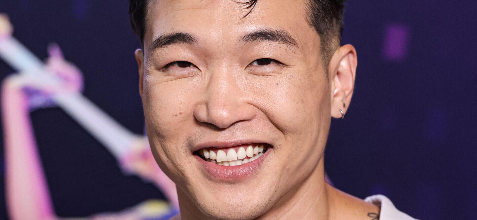 'KPop Demon Hunters' Star Joel Kim Booster Crashes Office Holiday Party