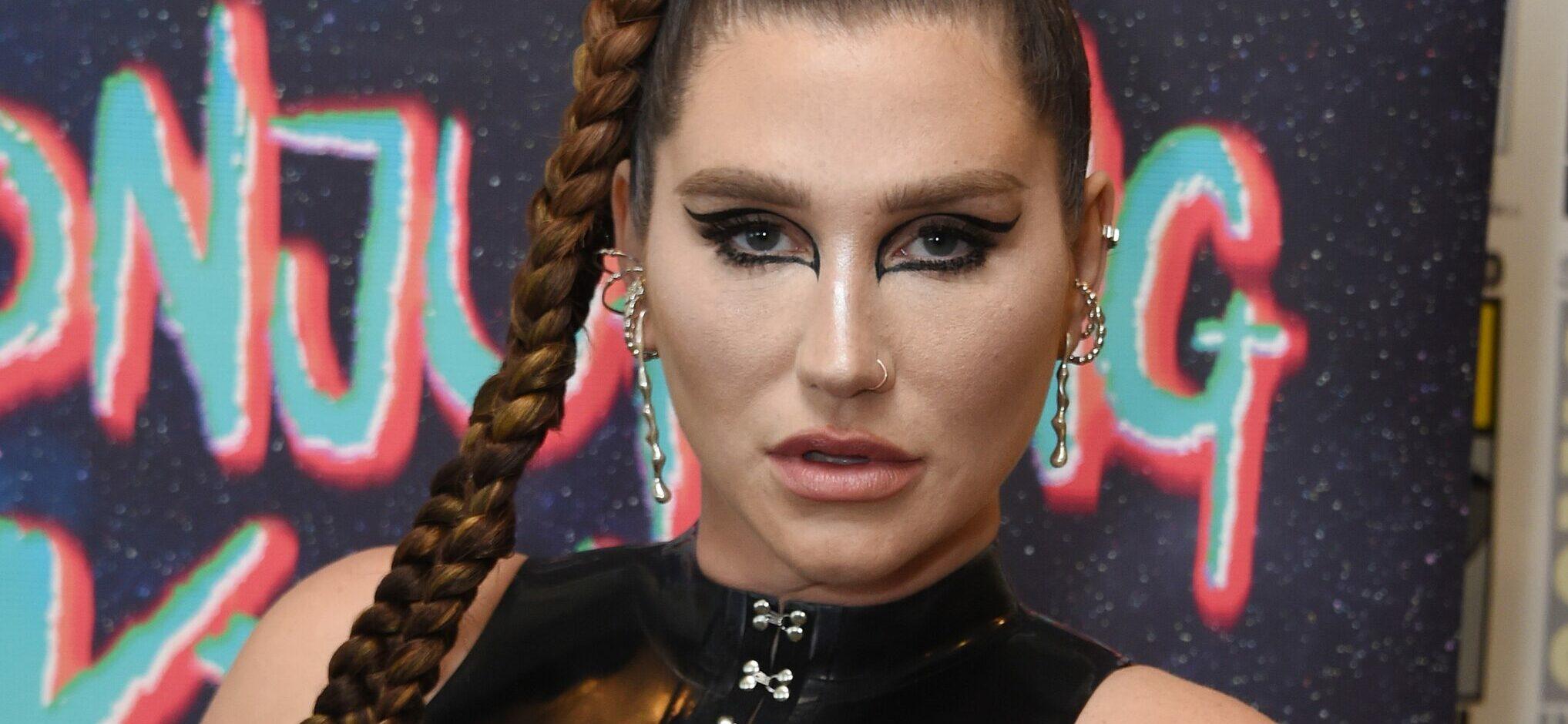 Kesha Flaunts Ample Cleavage Bouncing In A Black Bra