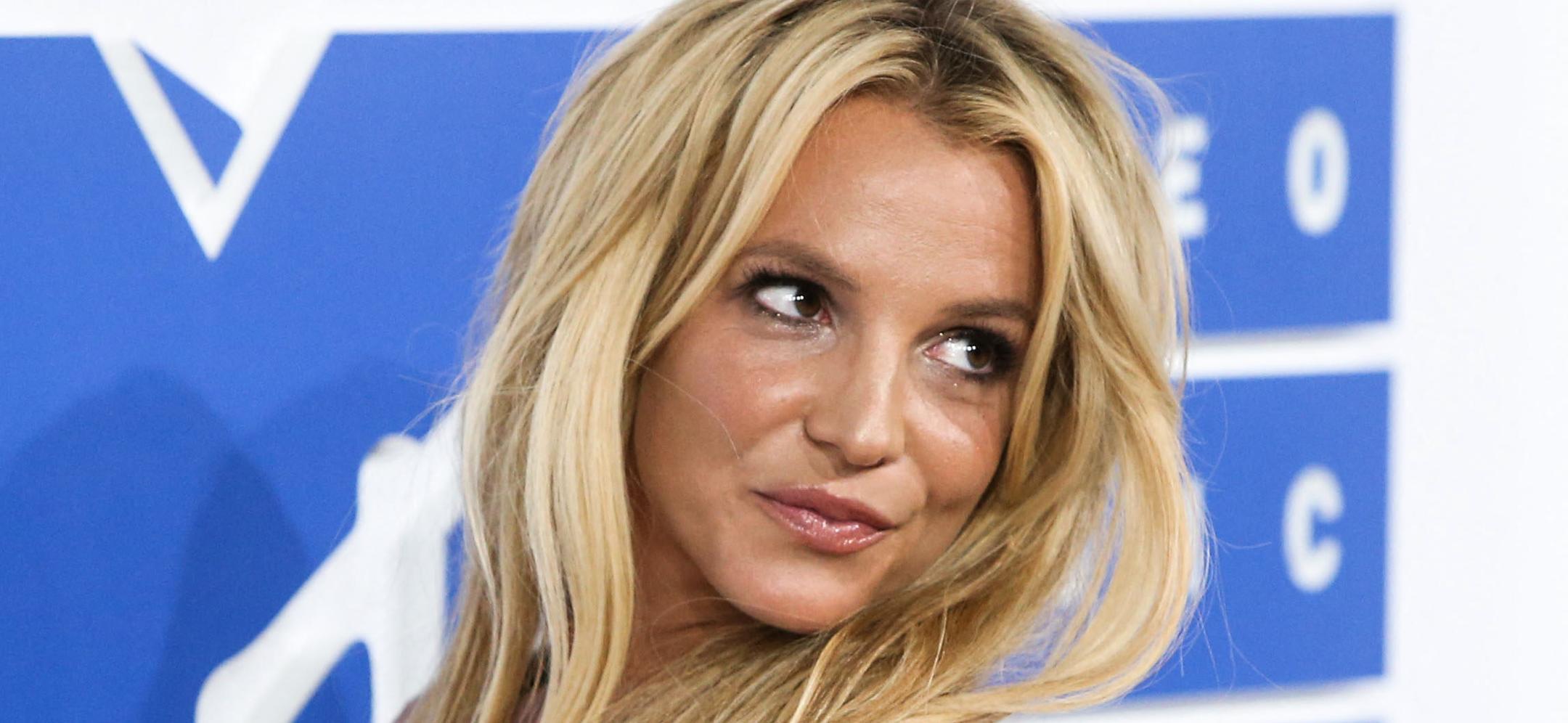 Britney Spears In Camo-Print Bikini Told She Needs To ‘Get Some Help’