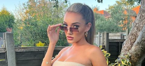 Beaux Raymond Appears Pantyless Under Her High Slit Dress