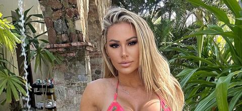 Kindly Myers In Stringy Blue Bikini Brings 'Paradise' To The Beach
