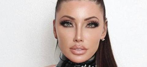 Holly Sonders In Hot Pink Swimsuit Highlights Her 'Lovely Assets'