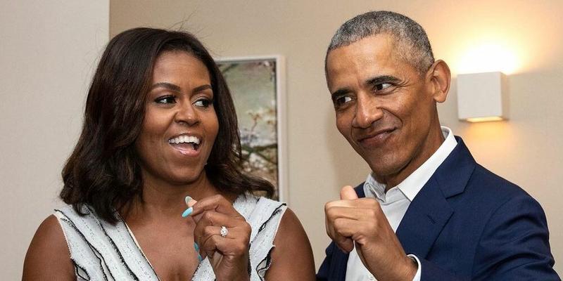 A photo of Barack Obama and Michelle Obama smiling