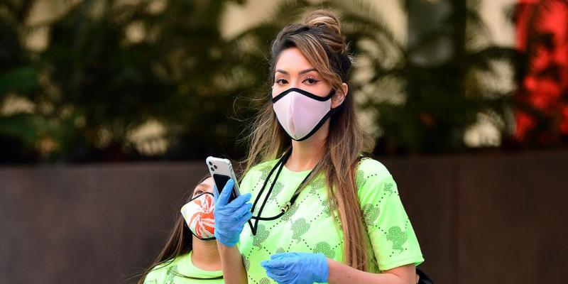 Farrah Abraham and Sophia wear gloves and designer face mask during a walk in Los Angeles