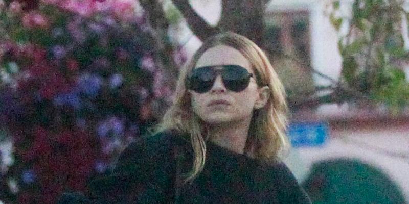 Ashley Olsen shows off a mystery engagement band while out with her Artist boyfriend Louis Eisner