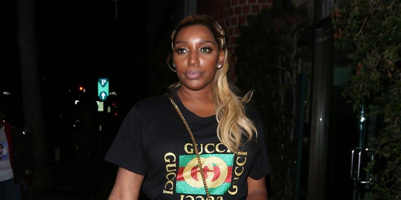 NeNe Leakes shows off her beautiful attire as she grabs dinner at Mr Chow restaurant with her friends