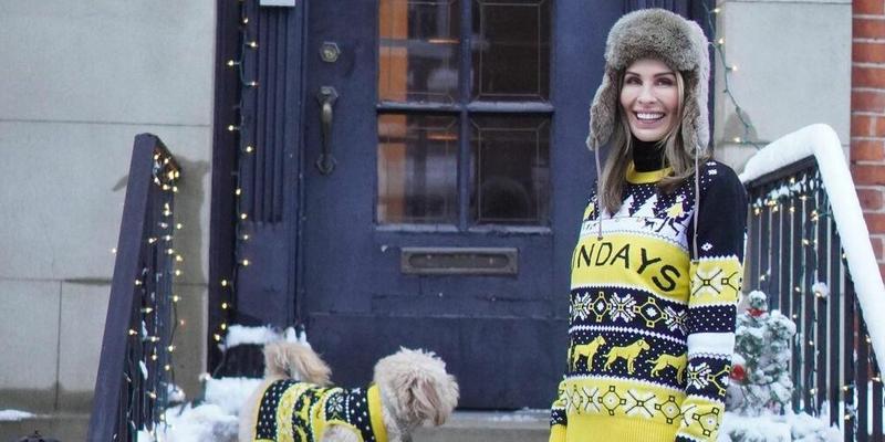 A photo showing Carole Radziwill and her dog outside her home in sweaters for the cold.