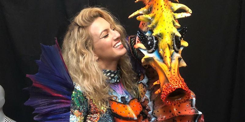 Tori Kelly takes a photo with her Seahorse mask from The Masked Singer