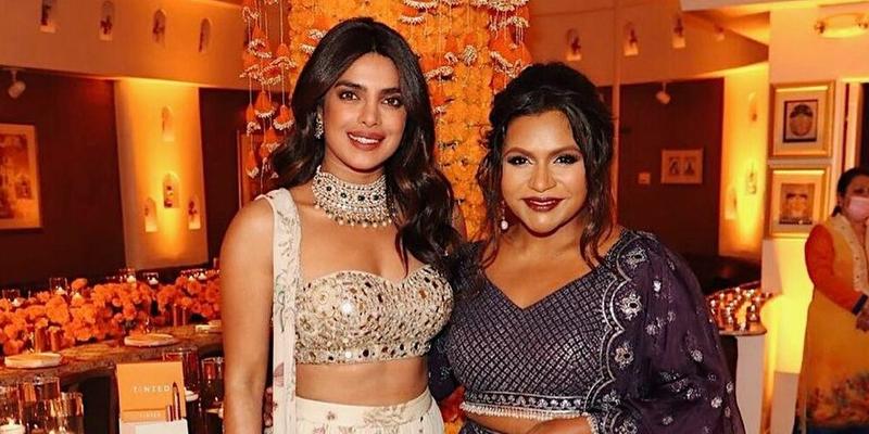 Priyanka Chopra and Mindy Kaling smiling