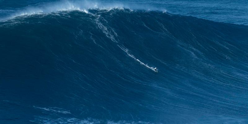 Big wave surfing in Nazare, Portugal - 08 Jan 2022