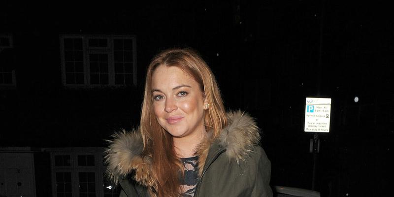Lindsay Lohan leaves a friends house and heads to a friends house in West London to celebrate their birthday
