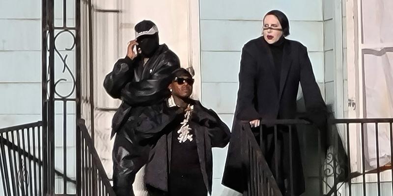 Marilyn Manson and Kanye West hang out on stage of a replica house of Kanyes late mother Donda in Chicago