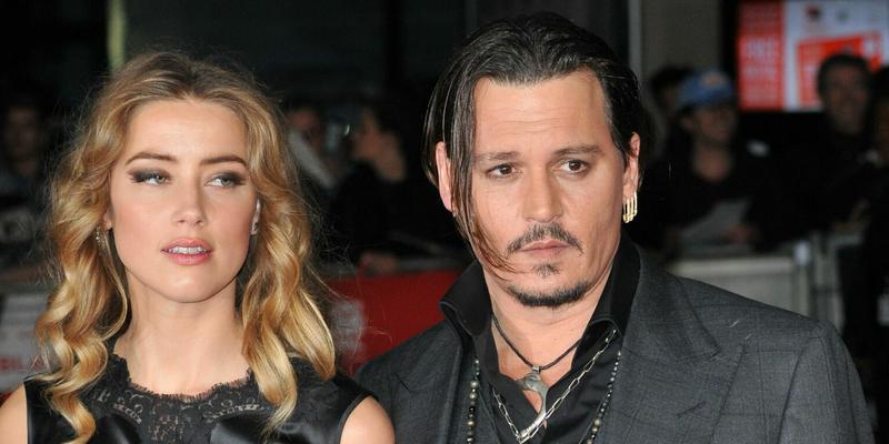 Amber Heard and Johnny Depp attend 'The Danish Girl' premiere during the 2015 Toronto International Film Festival held at the Princess of Wales Theatre on September 12, 2015 in Toronto, Canada.