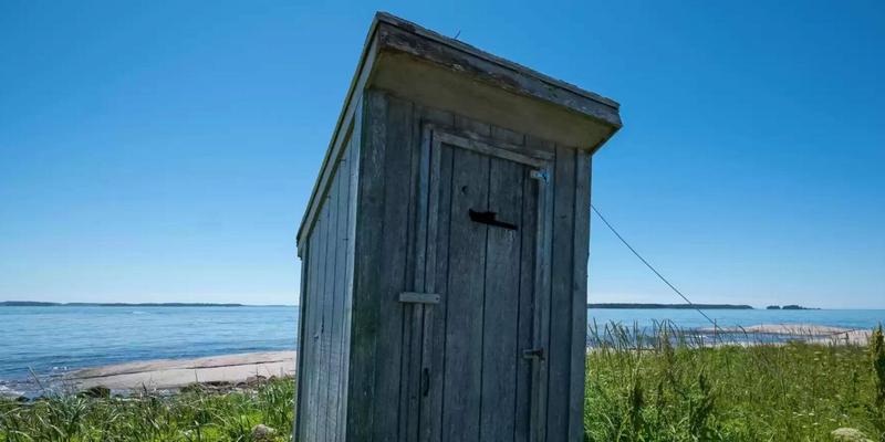 Remote private island with tiny cottage, outdoor toilet and no shower in chilly Maine on the market for $339,000