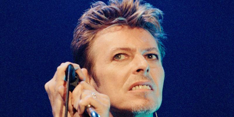 Pop star David Bowie performing on stage during a concert at The Scottish Exhibition and Conference Centre (SECC) in Glasgow.