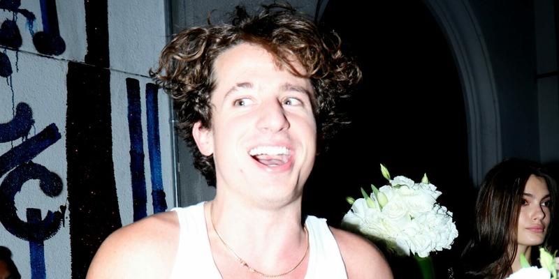 Charlie Puth helps friend carry out flower bouquets from dinner party at Craig apos s