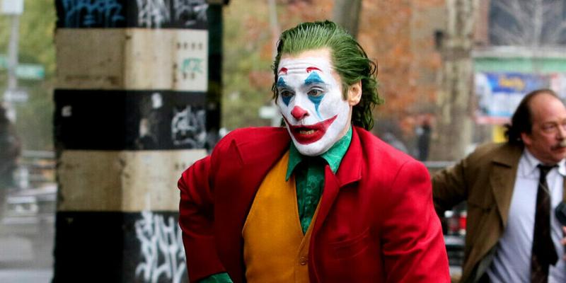 Joaquin Phoenix in full Joker costume and make-up filming dangerous stunt action scene in New York City, Joker 2