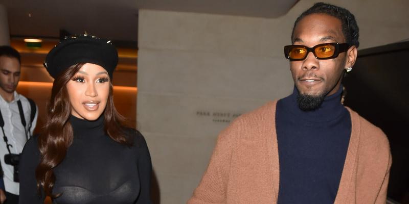 Cardi B shows some serious leg dressed in fishnets and a french beret with boyfriend Offset in Paris