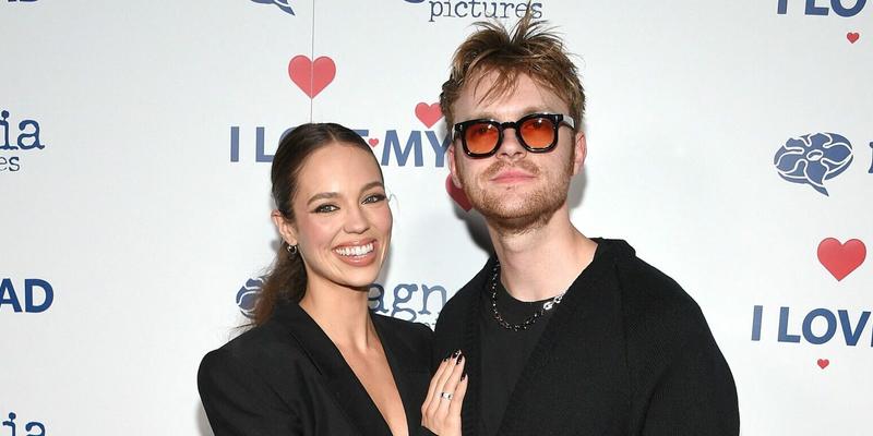 Claudia Sulewski and Finneas O'Connell on the red carpet